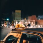 black taxi car during night
